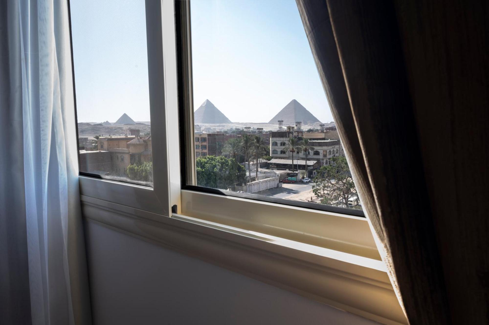 Palm Pyramids View Hotel Kafret el-Gabal Quarto foto